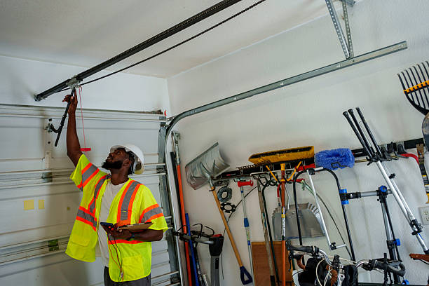 Professional Garage Door Panel Replacement technician working in Jefferson County County, NY
